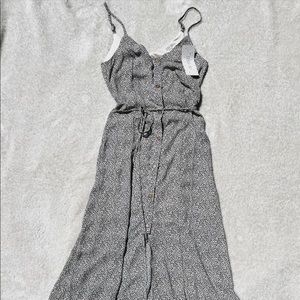 SIENNA SKY size xs fully functional button down dress.